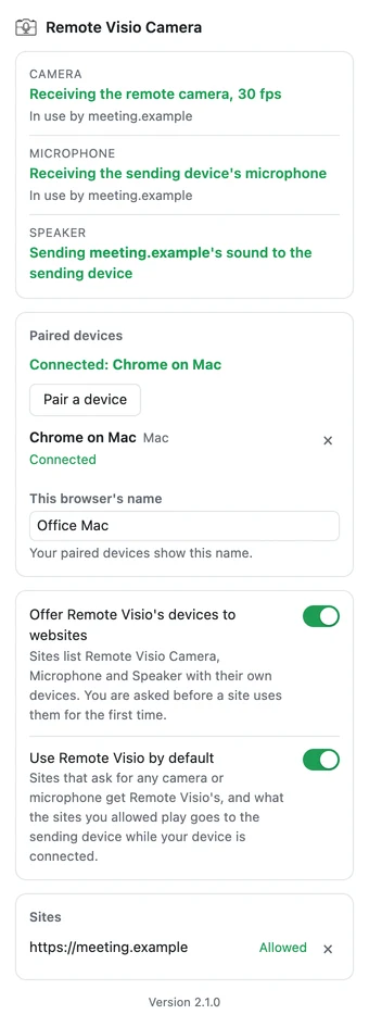 The Remote Visio extension's popup on the remote computer: camera, microphone and speaker all active for one allowed site, the paired device connected, the Pair a device button and the two switches.